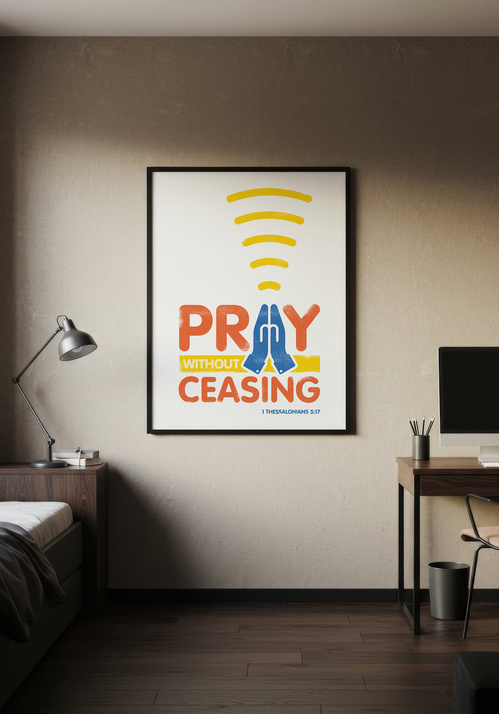 1 Thessalonians 5:17 art print in a black frame, displayed on a wall in a minimalist, warmly lit bedroom.