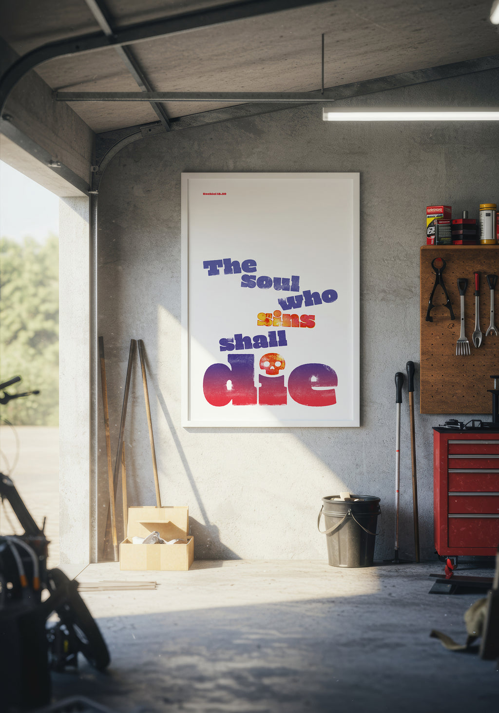 Ezekiel 18:20 art print in a white frame, displayed on a wall inside a modern, warmly lit garage.