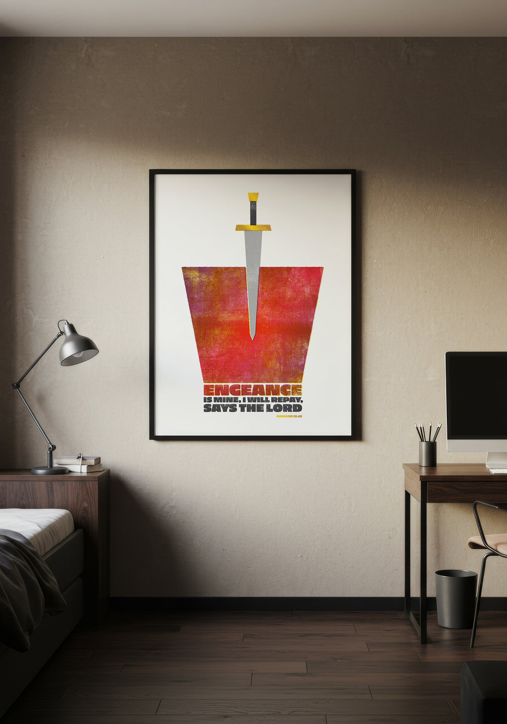 Romans 12:19 scripture art print in a black frame, displayed on a wall in a minimalist, warmly lit bedroom.