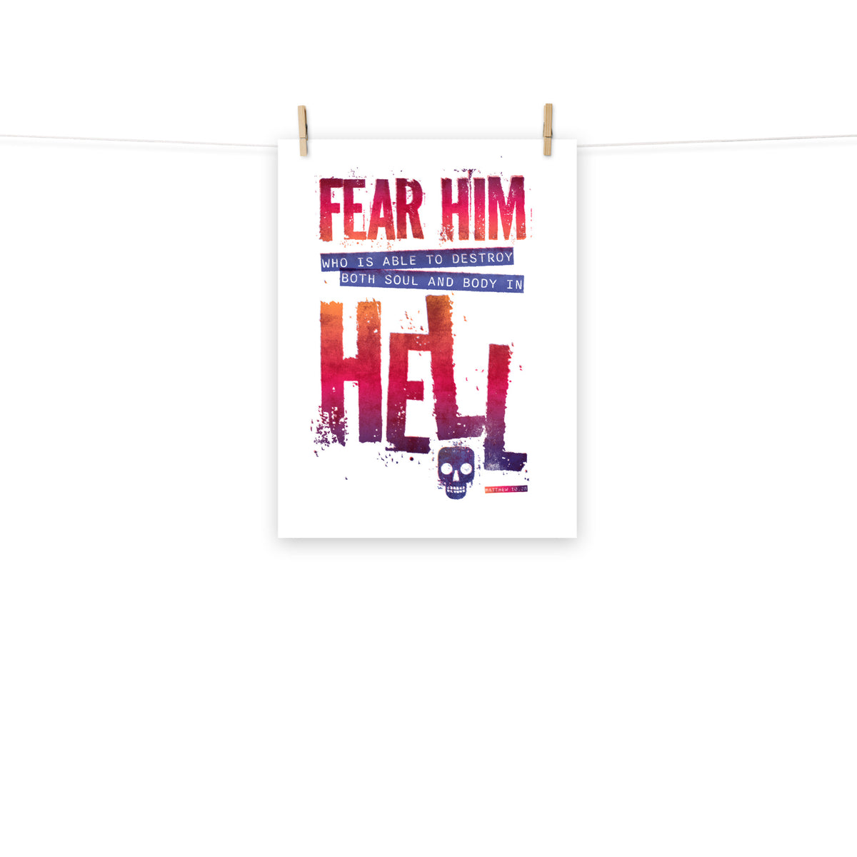 Full view of the Matthew 10:28 poster scroll, hung by wooden clips and rope, showing the complete design.
