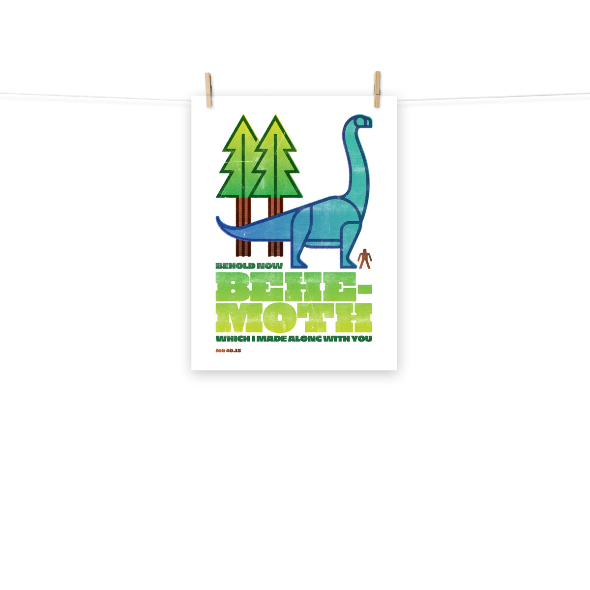 Full view of the Job 40:15 poster scroll, hung by wooden clips and rope, showing the complete design.