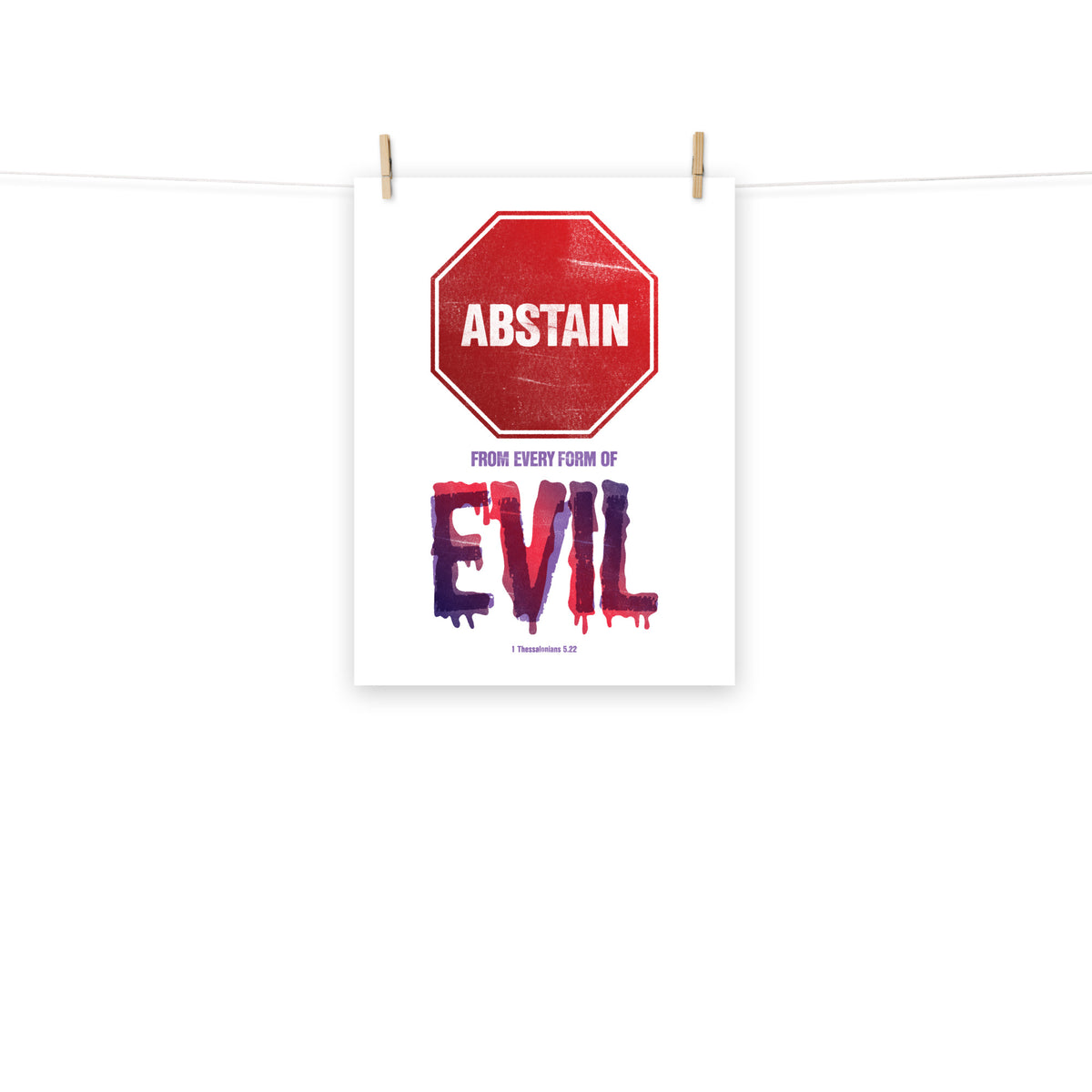 Full view of the 1 Thessalonians 5:22 poster scroll, hung by wooden clips and rope, showing the complete design.