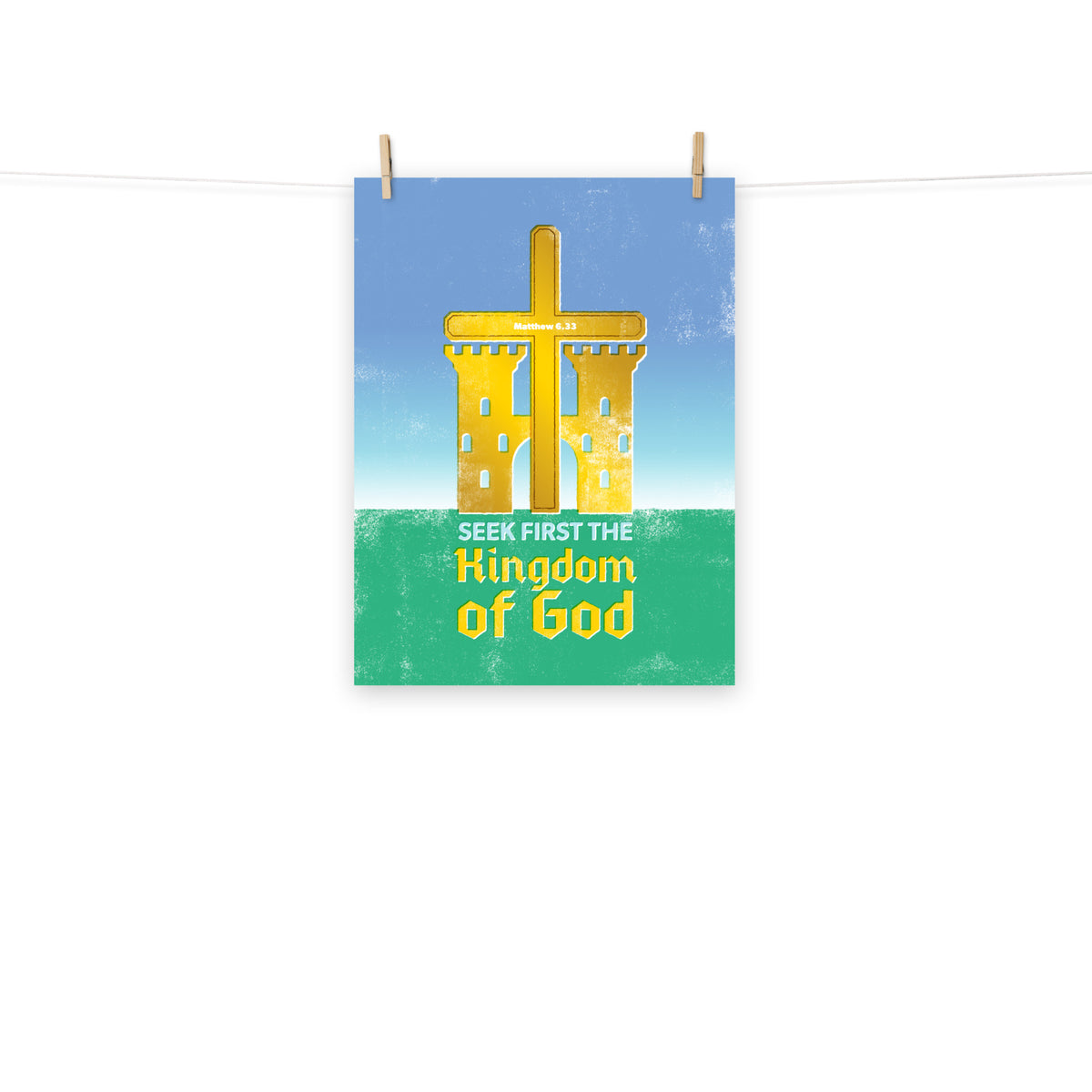 Full view of the Matthew 6:33 poster scroll, hung by wooden clips and rope, showing the complete design.