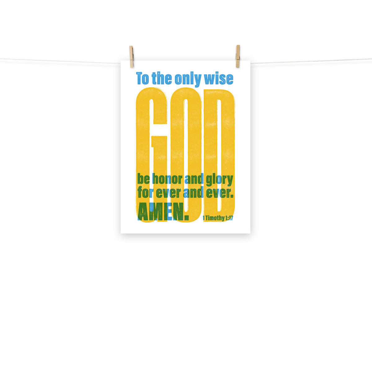 Full view of the 1 Timothy 1:17 poster scroll, hung by wooden clips and rope, showing the complete design.