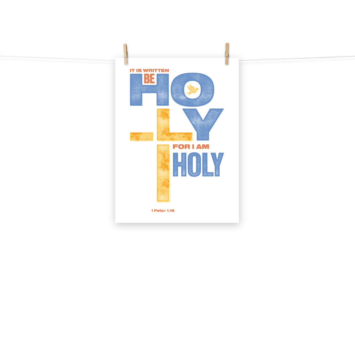 Full view of the 1 Peter 1:16 poster scroll, hung by wooden clips and rope, showing the complete design.