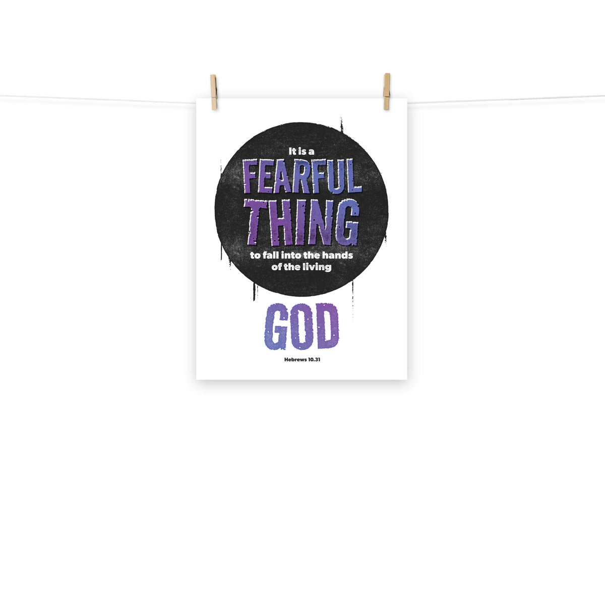 Full view of the Hebrews 10:31 poster scroll, hung by wooden clips and rope, showing the complete design. 