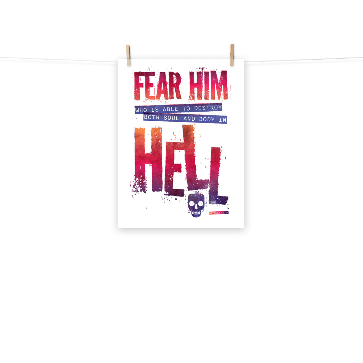 Full view of the Matthew 10:28 poster scroll, hung by wooden clips and rope, showing the complete design.
