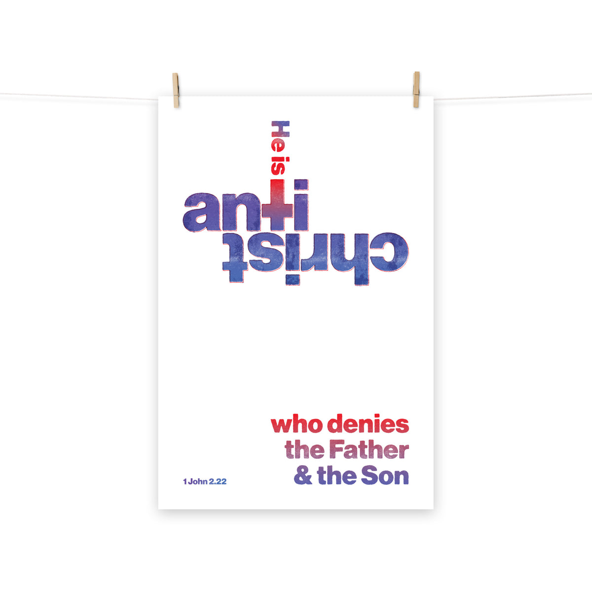 Full view of the 1 John 2:22 poster scroll, hung by wooden clips and rope, showing the complete design.