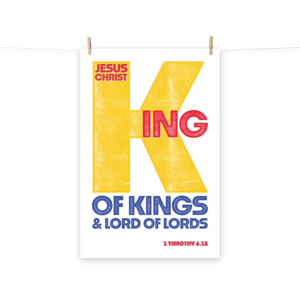 Full view of the 1 Timothy 6:15 poster scroll, hung by wooden clips and rope, showing the complete design.