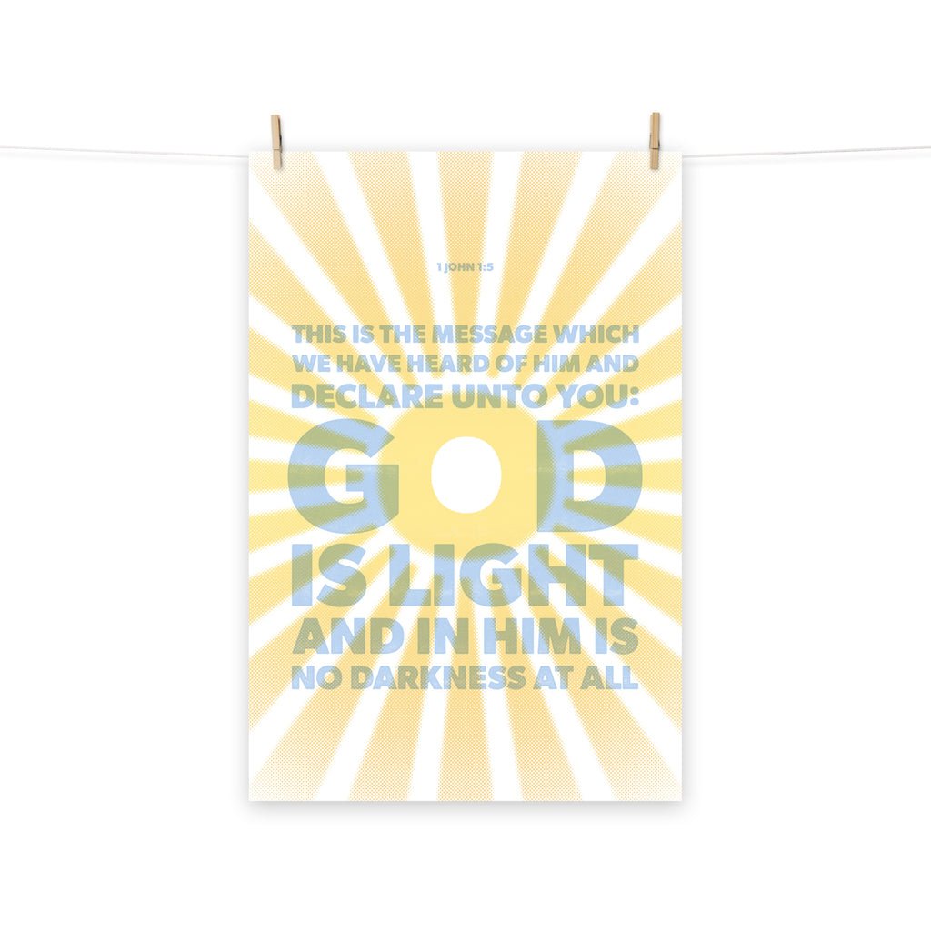 Full view of the 1 John 1:5 poster scroll, hung by wooden clips and rope, showing the complete design.