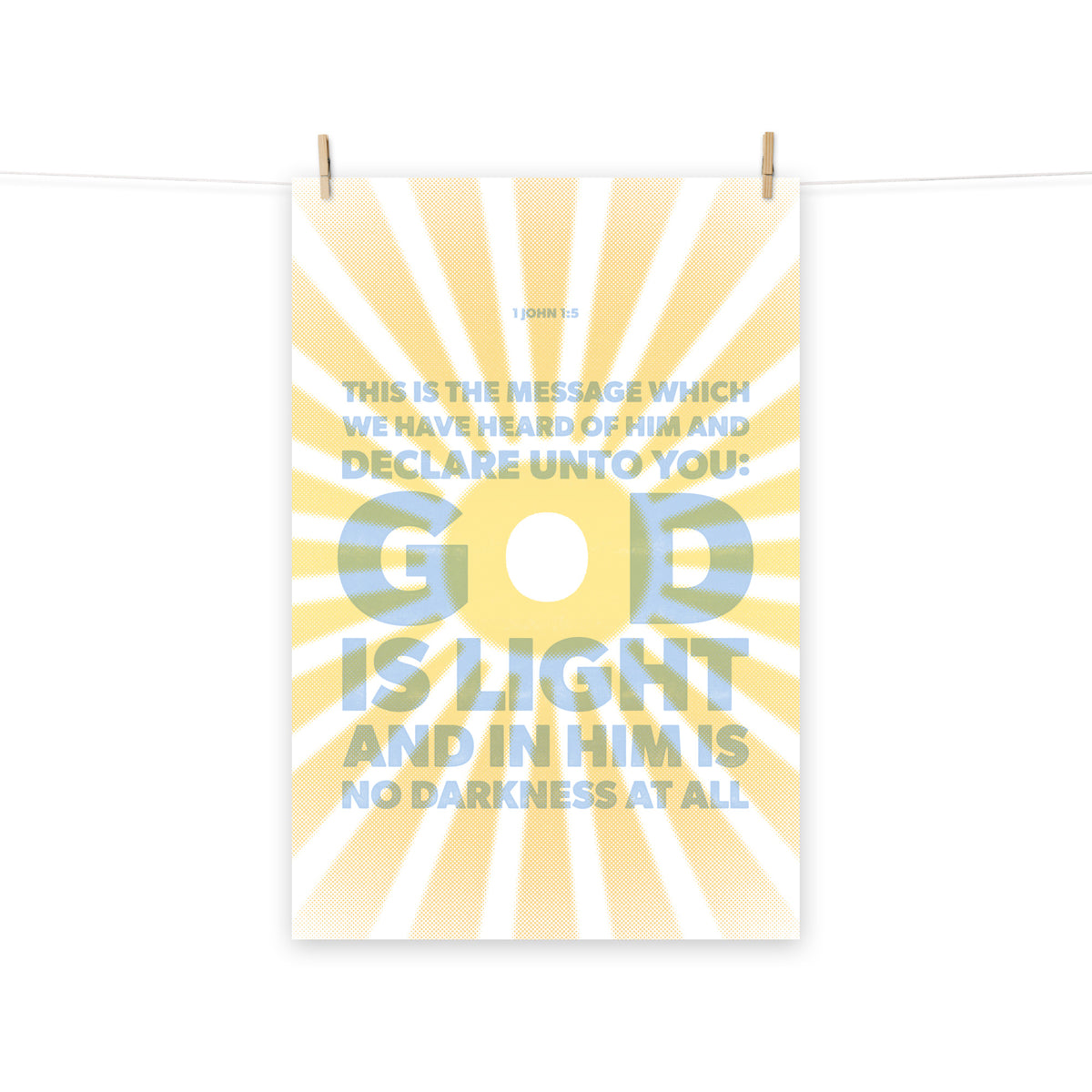 Full view of the 1 John 1:5 poster scroll, hung by wooden clips and rope, showing the complete design.