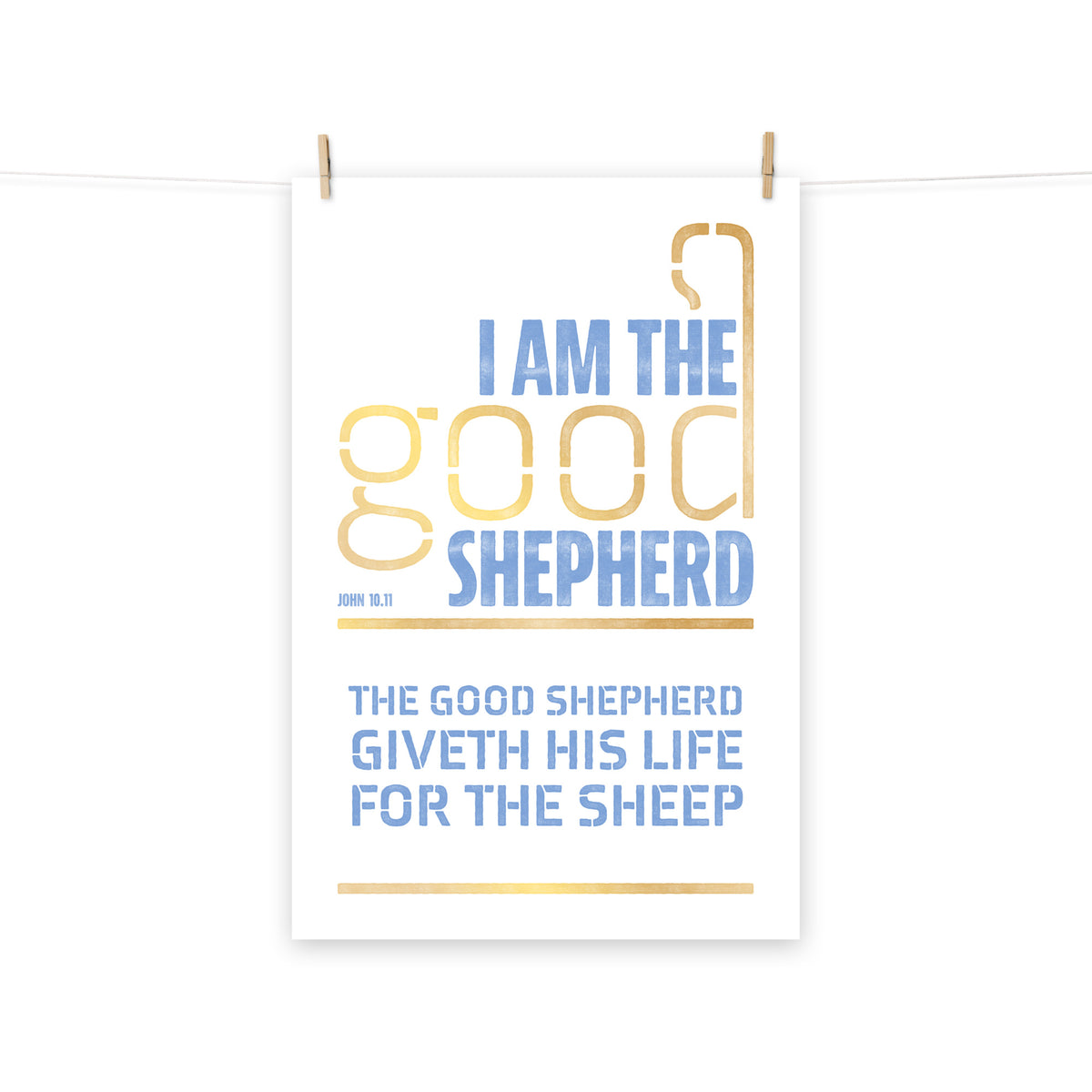 Full view of the John 10:11 poster scroll, hung by wooden clips and rope, showing the complete design.