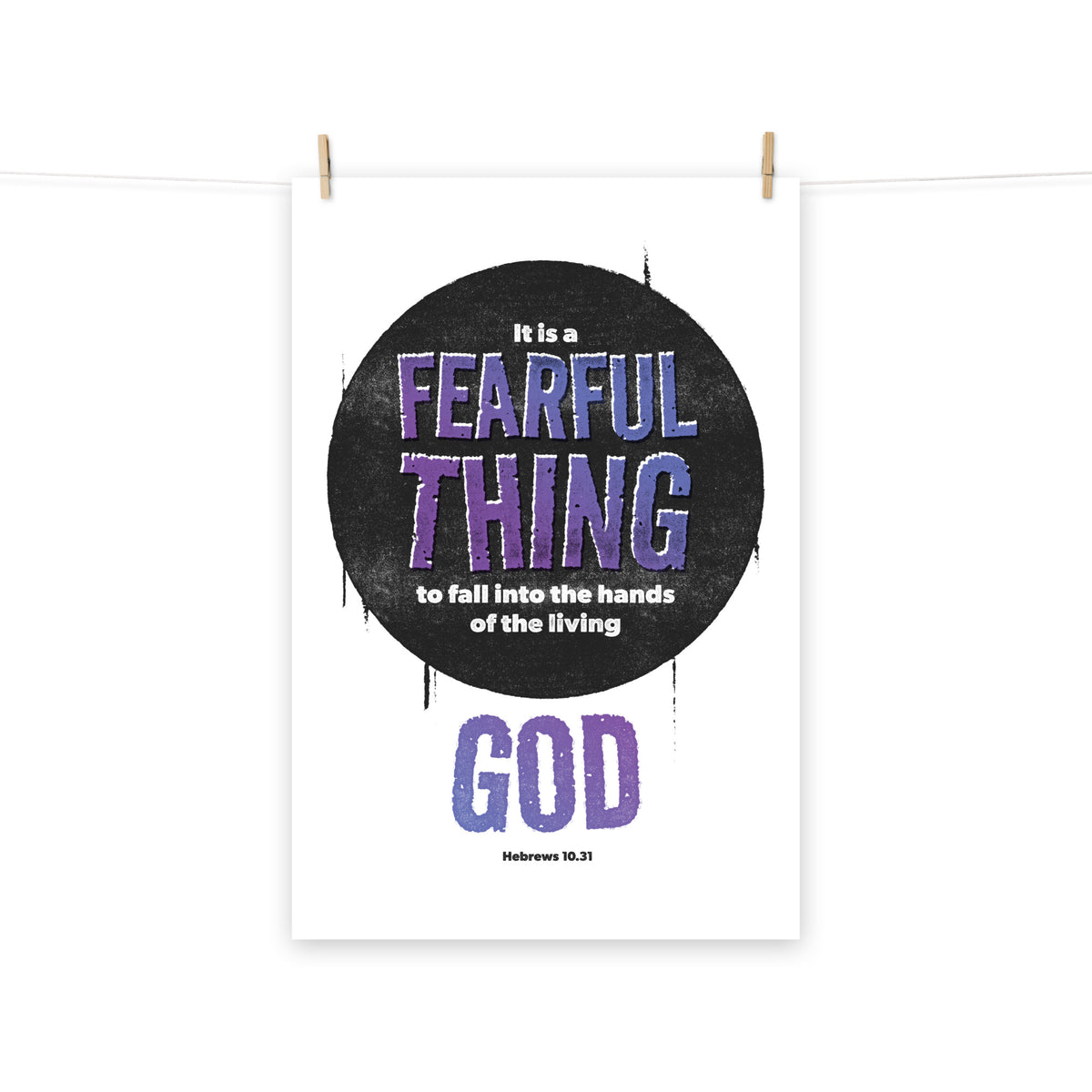 Full view of the Hebrews 10:31 poster scroll, hung by wooden clips and rope, showing the complete design. 