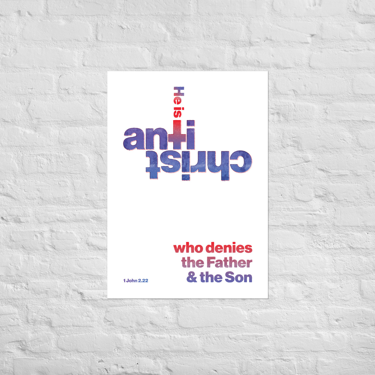 1 John 2:22 print mounted directly on a white brick wall for a frameless, modern look.