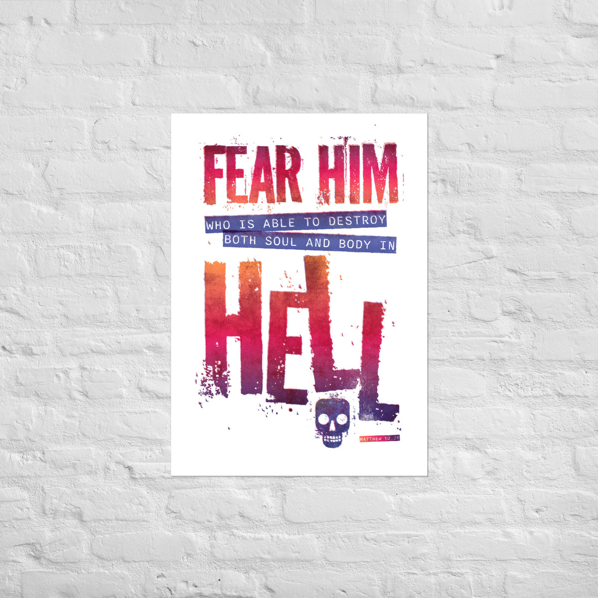 Matthew 10:28 print mounted directly on a white brick wall for a frameless, modern look.