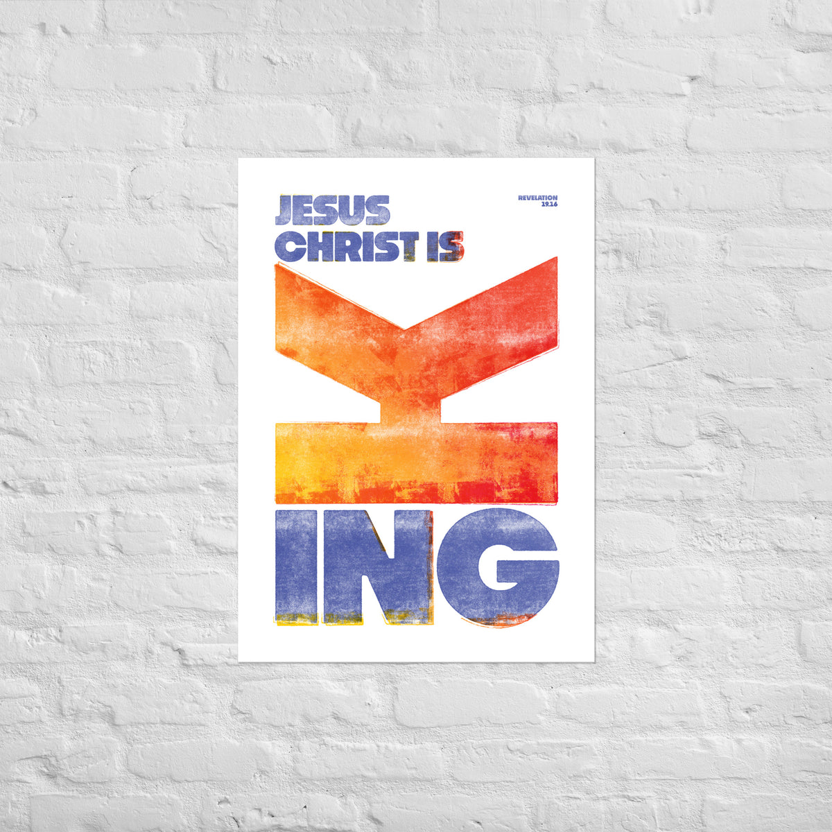 Revelation 19:16 print mounted directly on a white brick wall for a frameless, modern look.