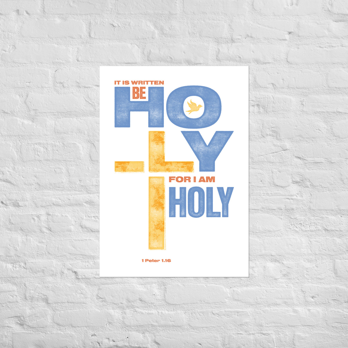 1 Peter 1:16 print mounted directly on a white brick wall for a frameless, modern look.