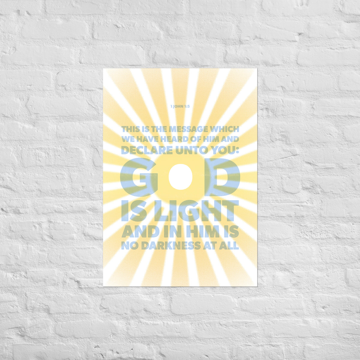 1 John 1:5 scripture print mounted directly on a white brick wall for a frameless, modern look.