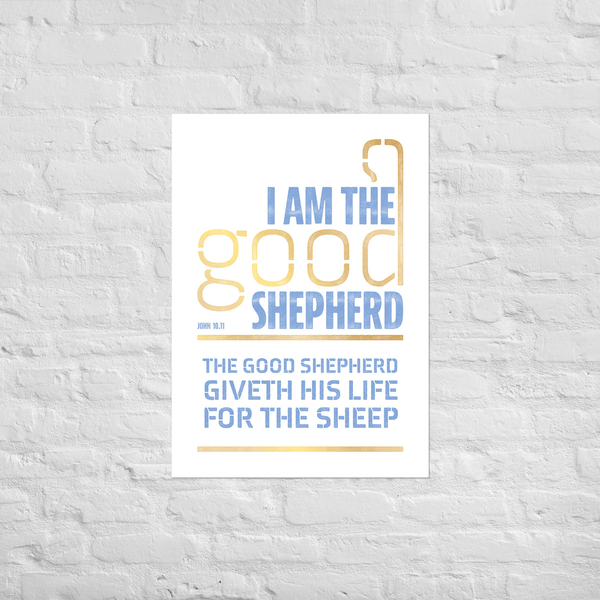 John 10:11 scripture print mounted directly on a white brick wall for a frameless, modern look.