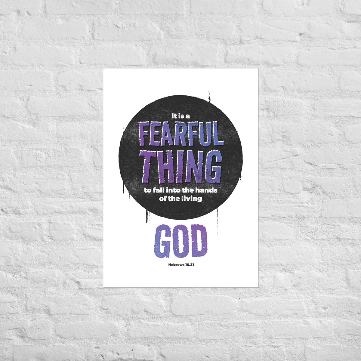 Hebrews 10:31 scripture print mounted directly on a white brick wall for a frameless, modern look.