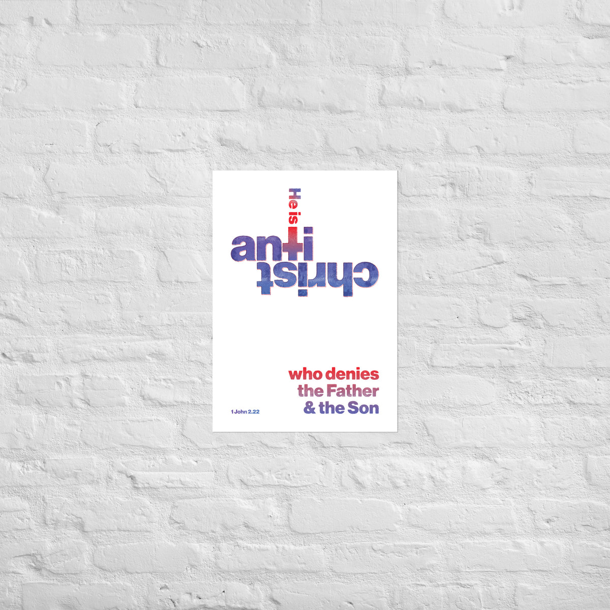 1 John 2:22 print mounted directly on a white brick wall for a frameless, modern look.