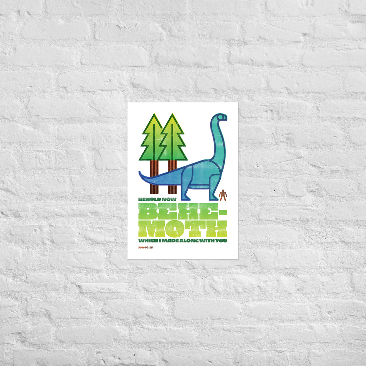 Job 40:15 print mounted directly on a white brick wall for a frameless, modern look.