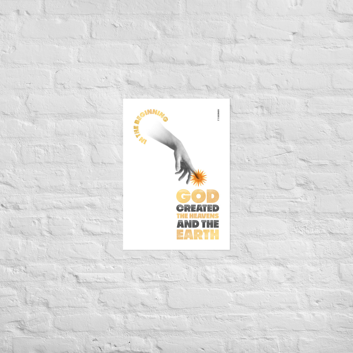 Genesis 1:1 print mounted directly on a white brick wall for a frameless, modern look.