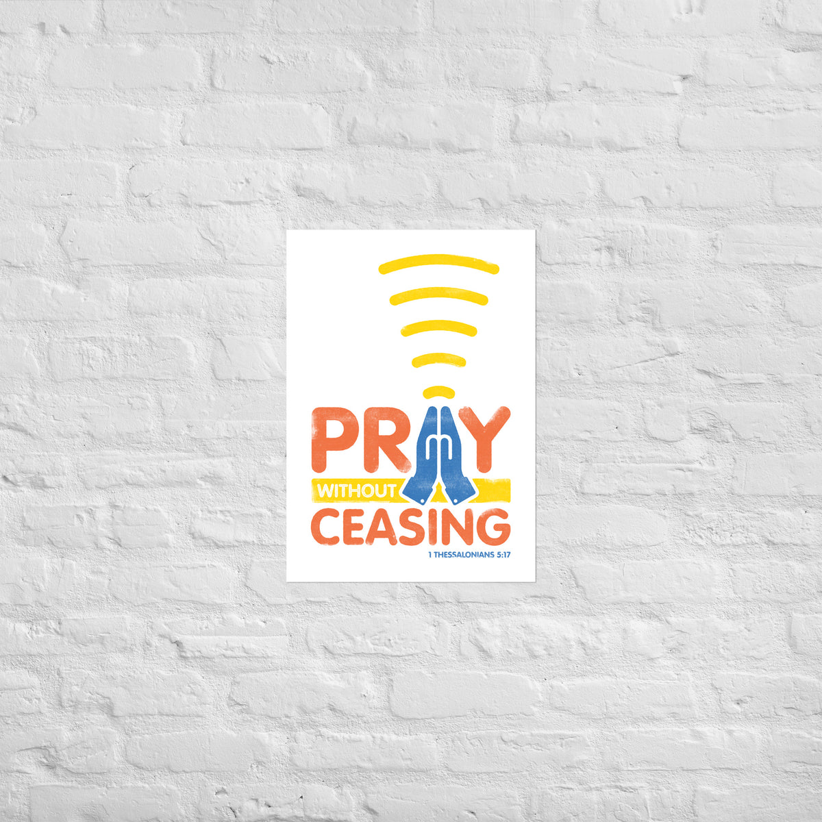 1 Thessalonians 5:17 scripture print mounted directly on a white brick wall for a frameless, modern look.