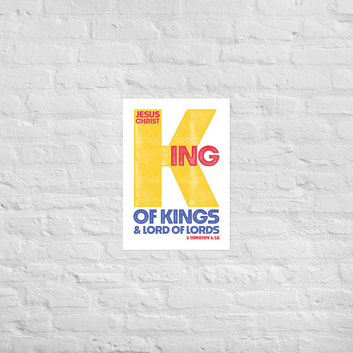 1 Timothy 6:15 print mounted directly on a white brick wall for a frameless, modern look.