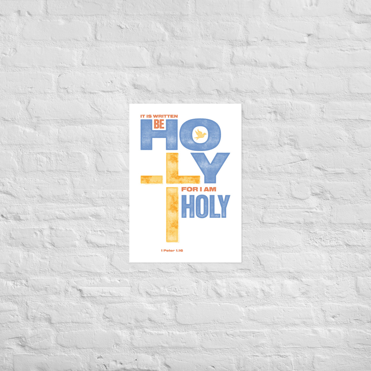 1 Peter 1:16 print mounted directly on a white brick wall for a frameless, modern look.