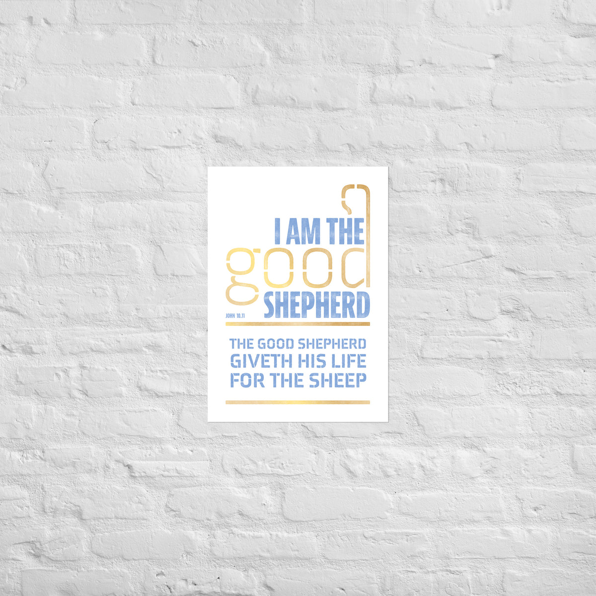 John 10:11 scripture print mounted directly on a white brick wall for a frameless, modern look.