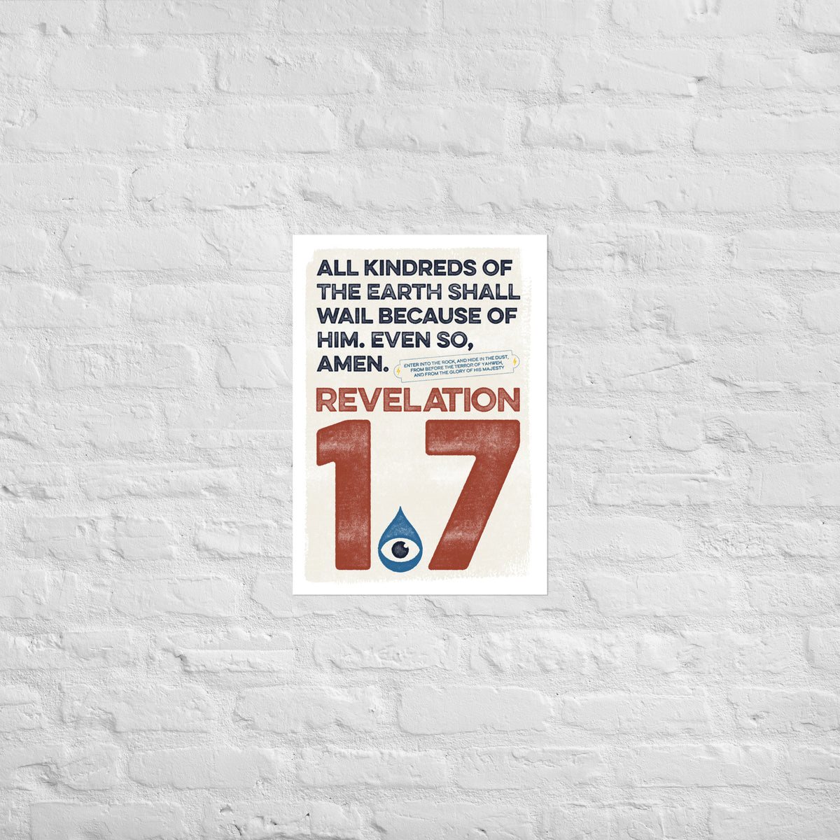 Revelation 1.7 scripture print mounted directly on a white brick wall for a frameless, modern look.