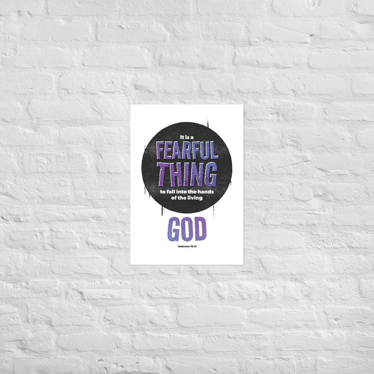 Hebrews 10:31 scripture print mounted directly on a white brick wall for a frameless, modern look.